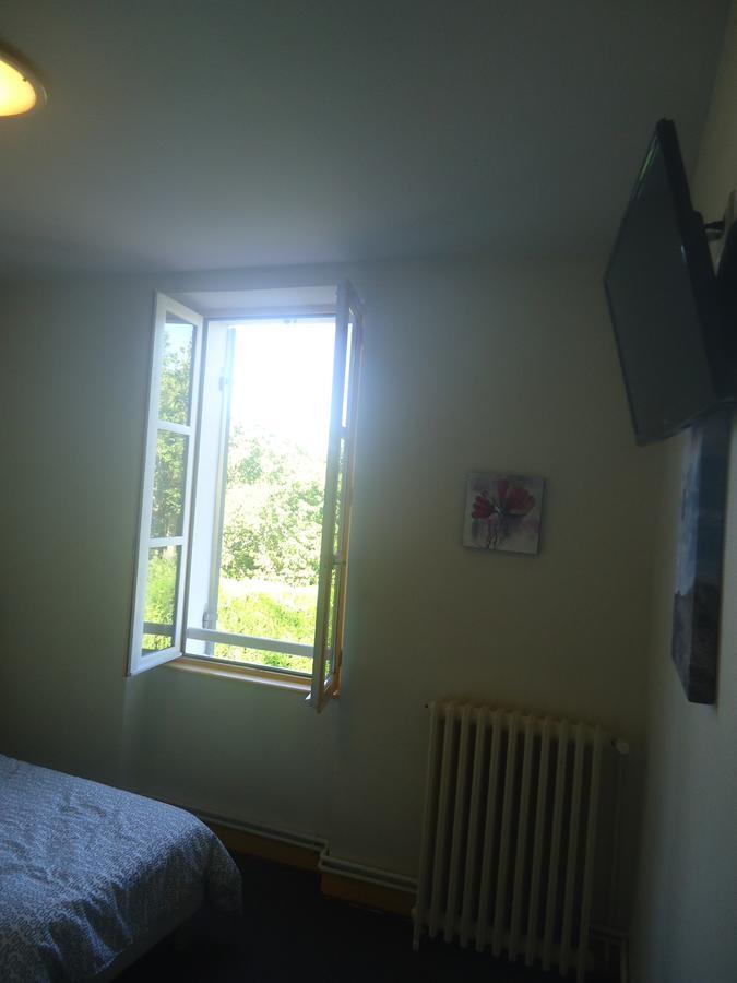 Logis Hotel Du Champ De Foire Saint-Aulaye-Puymangou エクステリア 写真